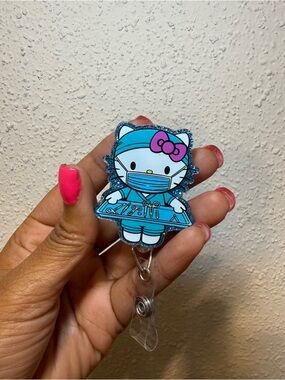 Hello Kitty Blue Scrub Badge Reel with Pink Bow